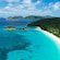 Islets near an unspoiled beach with lush vegetation